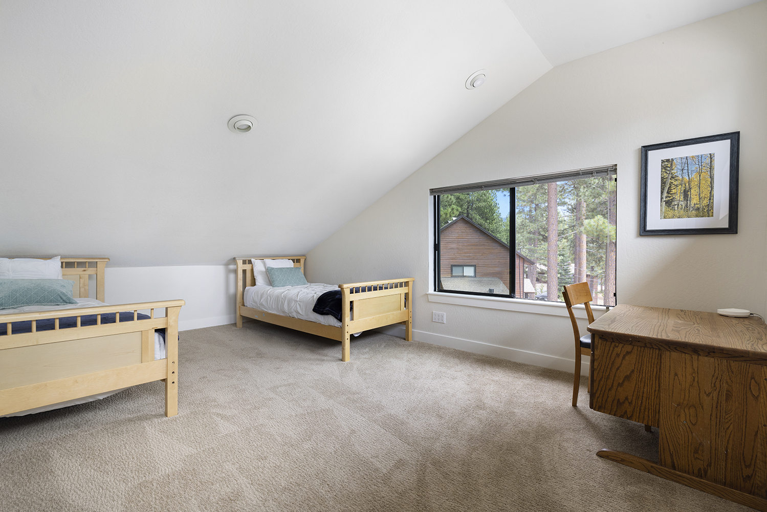 Bedroom 6 with twin XL beds and vaulted ceiling at Kinpine House in Incline Village