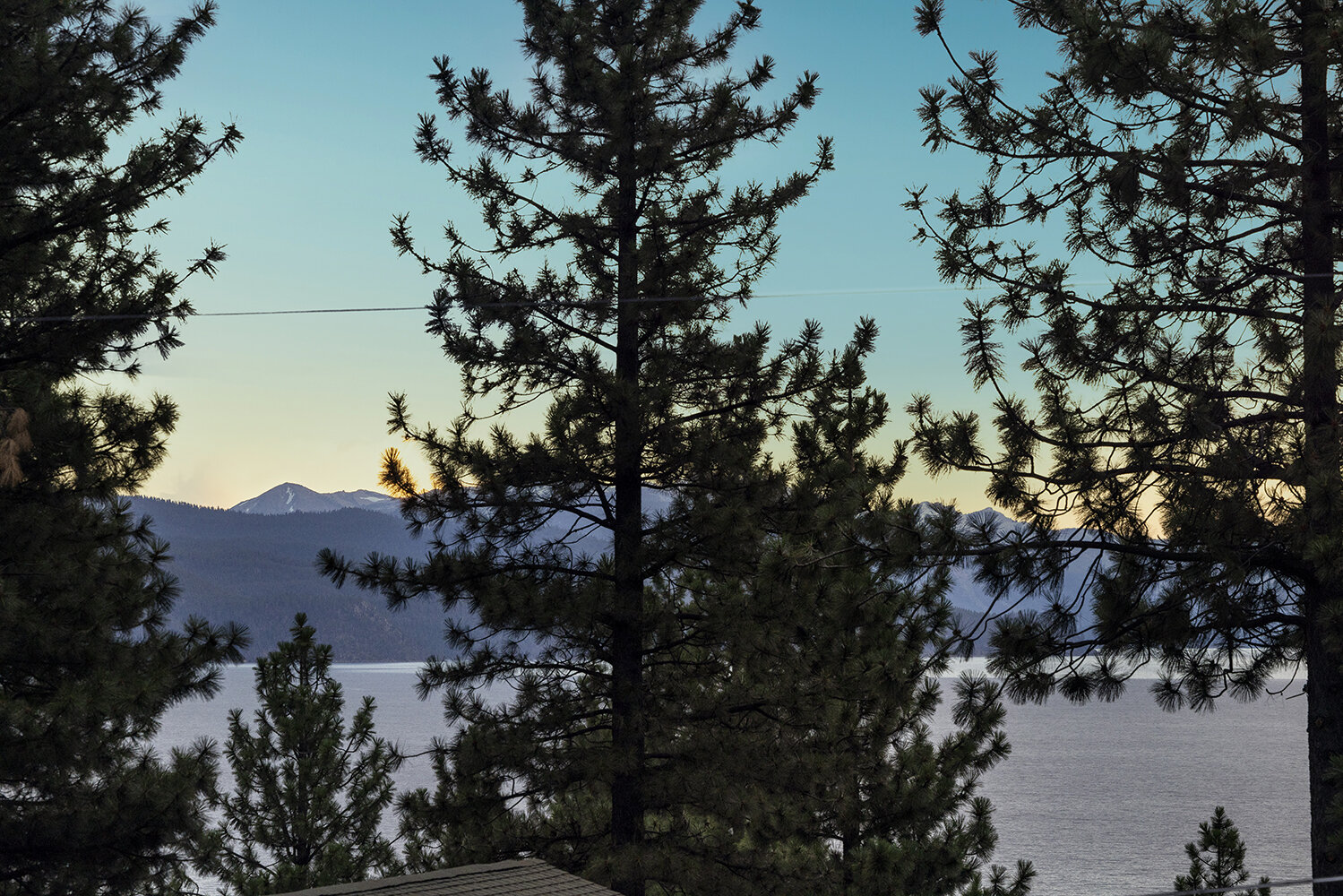 The far shore of Lake Tahoe at dusk from above Incline Village